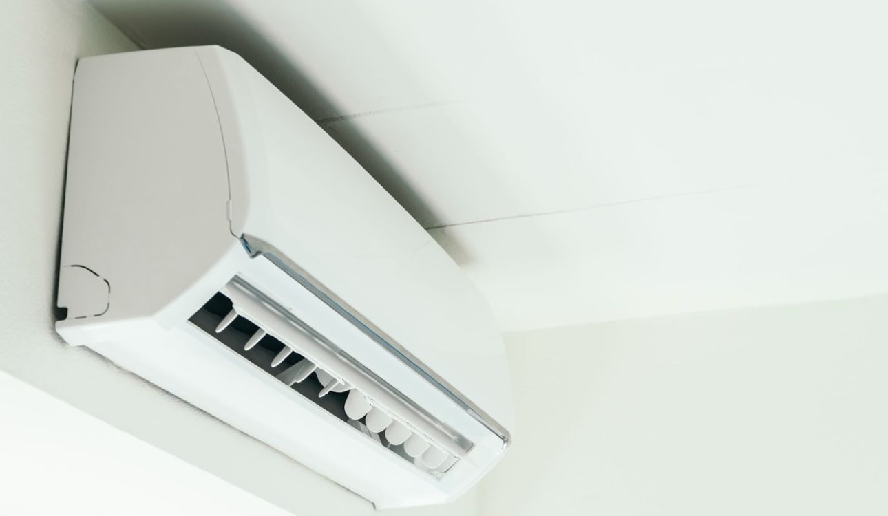 Active wall-mounted AC unit providing cooling in a domestic living space
